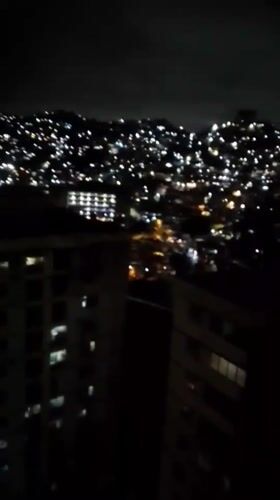 Caracas residents document birthday celebration and nighttime city views