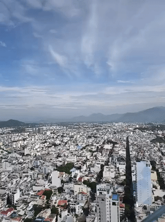Nha Trang cityscape from above, coast and mountains in view
