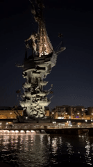 Illuminated ship-like monument with water features filmed in Moscow