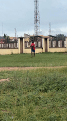 Young men play casual soccer in Ihiagwa, Nigeria