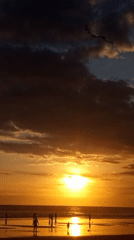 Sunset beach activities captured across Kuta, Indonesia coastline