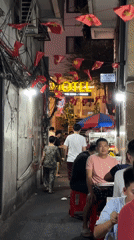 Flag-decorated alley hosts community dining in Thủ Đức, Vietnam