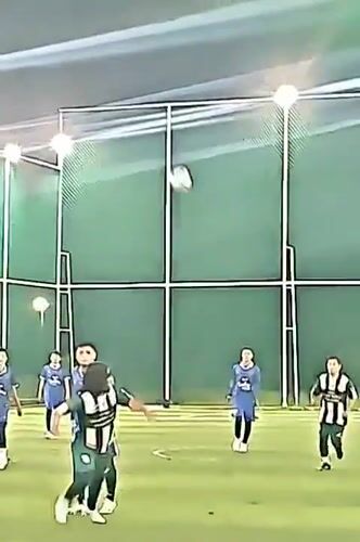 Nighttime soccer match filmed in Lhokseumawe, Indonesia