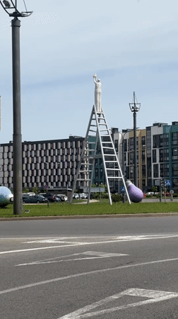 Luxury cars spotted near public art in Belarus village