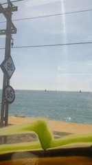 Sailboats spotted off Arenys de Mar coast on clear day
