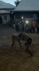 Traditional wrestling match draws spectators in rural Nigerian village