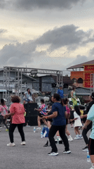 Outdoor group fitness class underway in Phuket City, Thailand