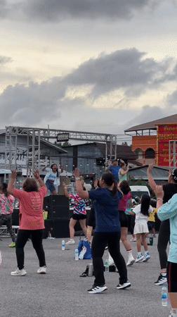 Outdoor group fitness class underway in Phuket City, Thailand