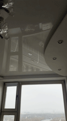 Moscow room captures cityscape view with red bridge reflection