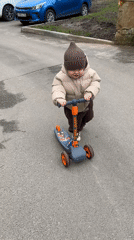 Toddler enjoys scooter ride and family time in Klin