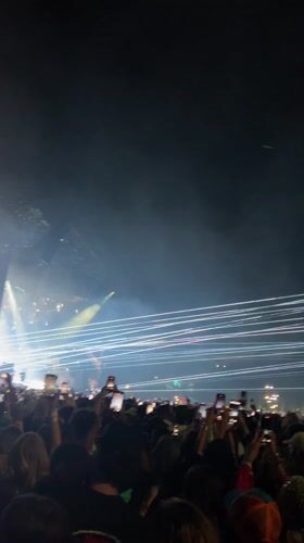 Early morning concert draws crowds in Indio amid laser shows