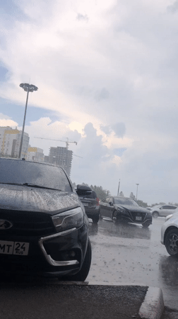 Krasnoyarsk under a heavy overcast, parking lots and city views