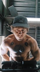 Man exercises with bench routine in Dalung, Indonesia
