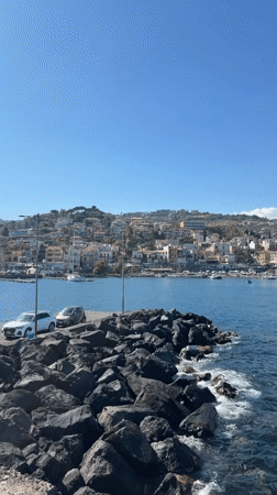 Coastal views captured in Aci Castello, Sicily on sunny afternoon