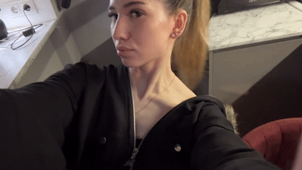 Woman records herself indoors in Khimki, Russia