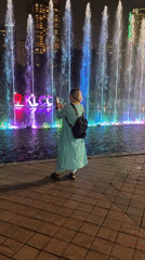 Crowds gather for nighttime fountain show at KLCC Park