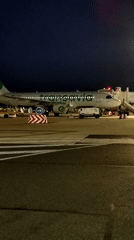 Transavia plane docked at airport gate overnight