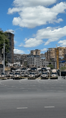 Black vehicles cordoned with police tape in Yerevan