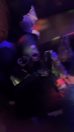Evening social gathering at Jos nightclub with dancing, soccer viewing