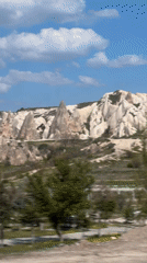 Tourist captures Cappadocia's fairy chimneys from moving vehicle