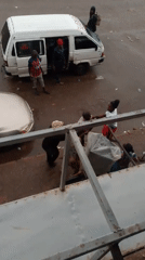 Daily street life documented in Bukuru, Nigeria amid rain