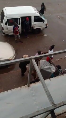 Daily street life documented in Bukuru, Nigeria amid rain
