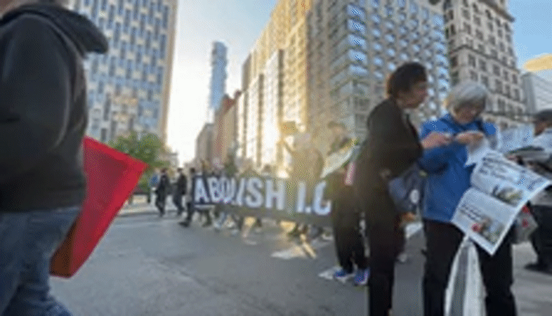 Protest march with 'ICE OUT' signs moves through NYC streets
