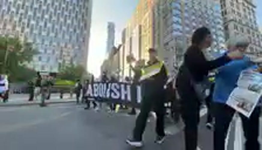 Protest march with 'ICE OUT' signs moves through NYC streets
