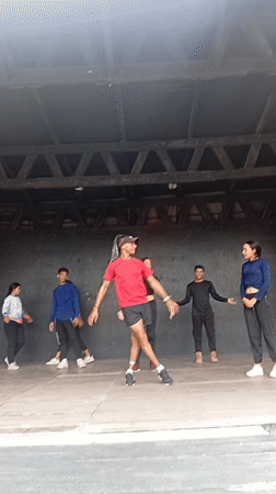 Dance group rehearses on stage at Playa El Agua