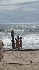 Morning beach activities observed at unidentified coastal location