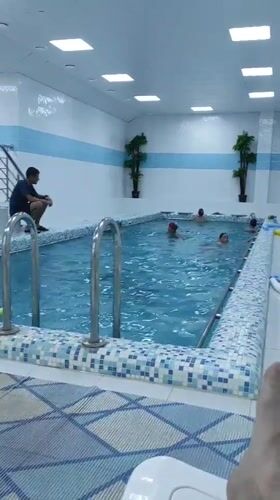 Kids swimming at an indoor pool in Noviy, Russia