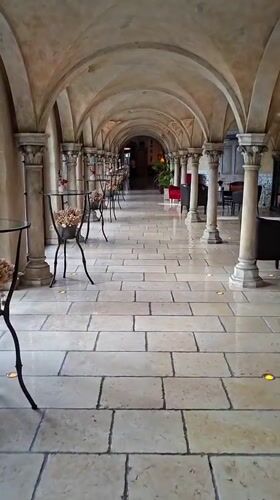 Inside a historic Rheinhausen venue with knights and stone halls