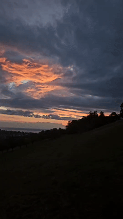 Time-lapse sunset over Swiss hillside, St. Gallen