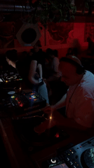 DJs perform at dimly lit London club Saturday evening