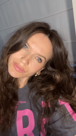 Woman records selfie video in Khimki, Russia
