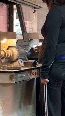 Woman observed working at bench in Buenos Aires