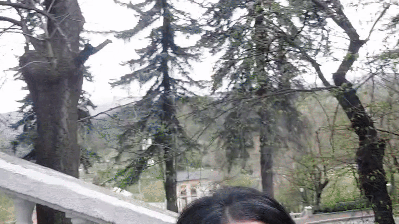 Person records video message in Dilijan, Armenia