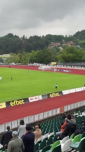 Soccer match played in Gabrovo Bulgaria stadium afternoon
