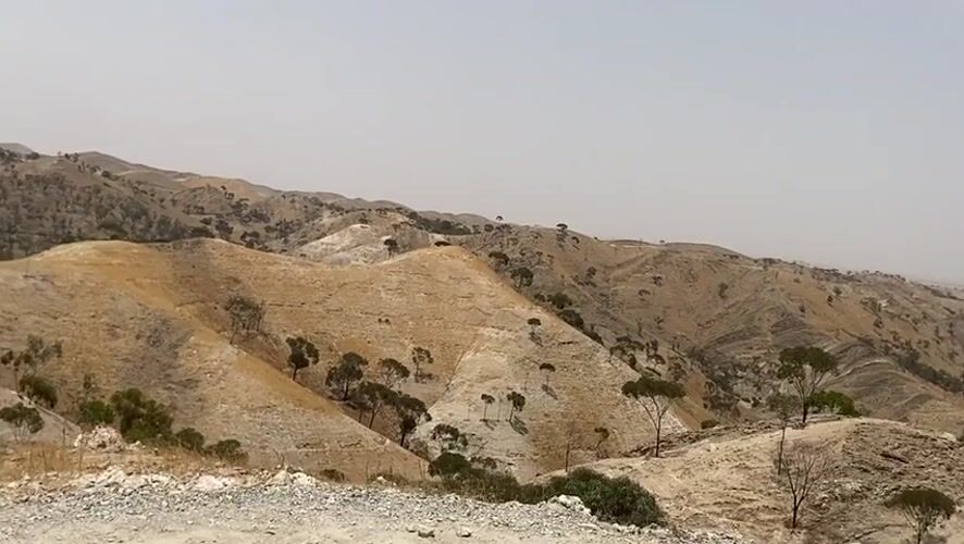 Arid mountain terrain and a dirt path near Ait Said Oucho, Morocco