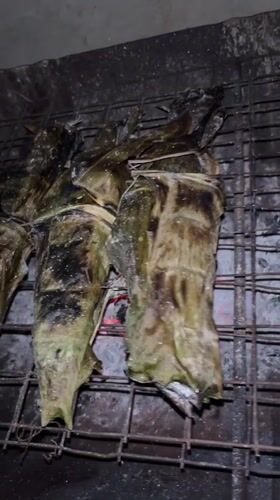 Traditional Sri Lankan meal preparation and dining captured in Thalaramba