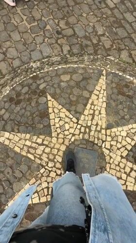Tourist explores coastal viewpoints and pathways in Santana, Portugal