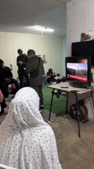 Families gather in shelter space in Tel Aviv