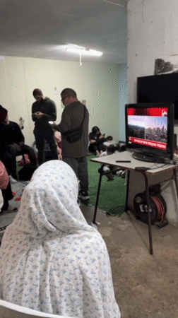 Families gather in shelter space in Tel Aviv