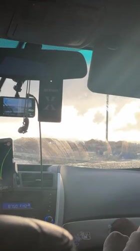 Rainy driving conditions recorded via dashcam in Zarya, Russia