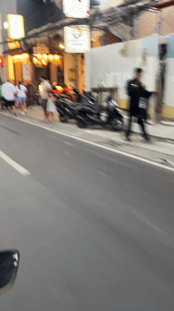 North Kuta street life: shops, scooters, and nightlife venues