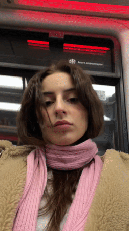 Woman in brown jacket spotted on Moscow train