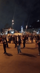 Night protest in Providencia: drums, red flags, and riot police