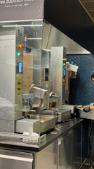 Automated döner machines slice meat in Zurich kitchen