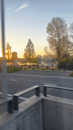 Vehicle captures sunset view of Amsterdam's iconic sign area