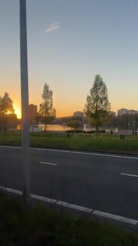 Vehicle captures sunset view of Amsterdam's iconic sign area